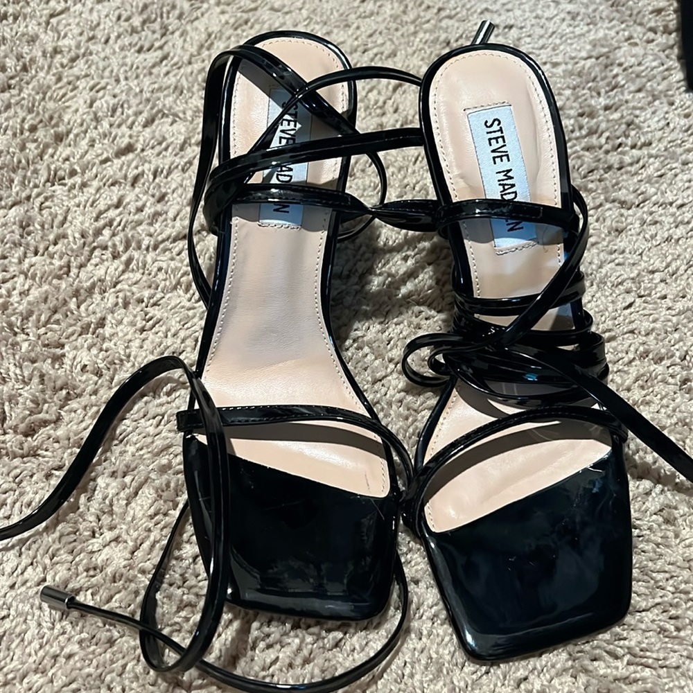 Black strappy Steve Madden heels.